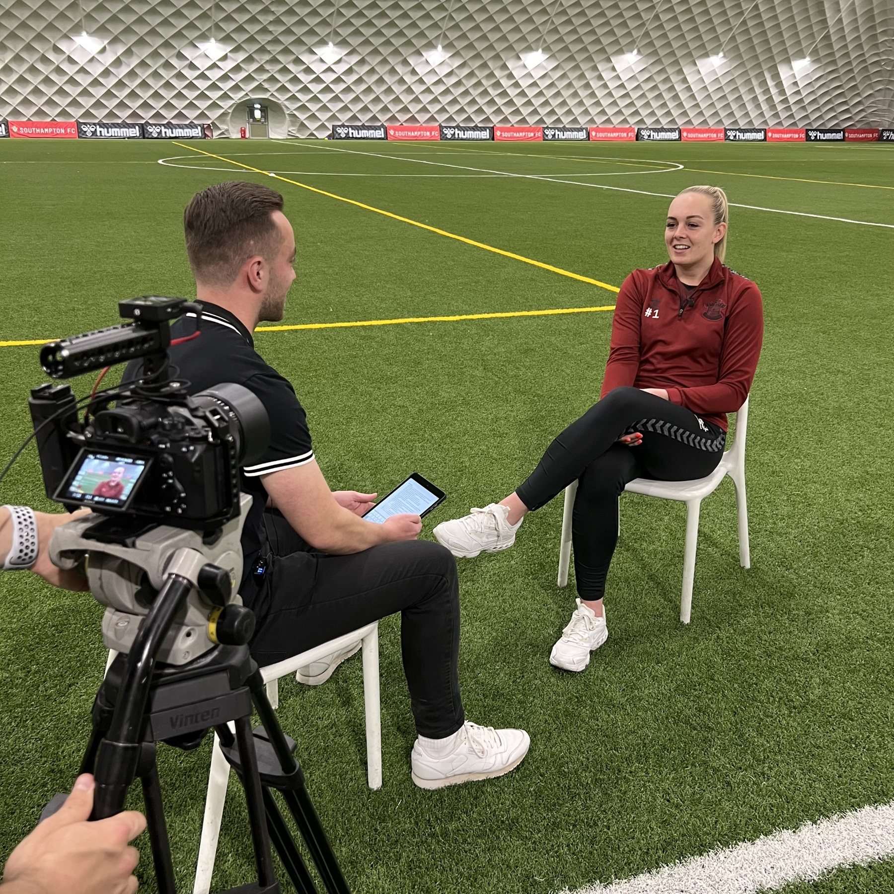Me interviewing a footballer at a Southampton training facility